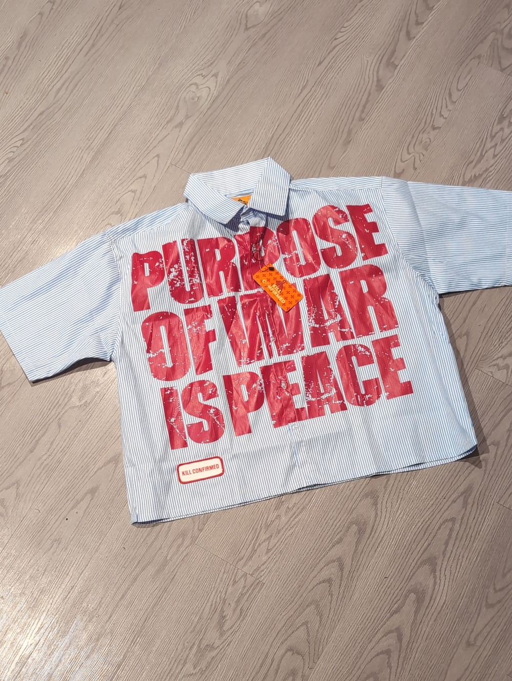 Striped Button-Down Shirt with Bold Red Slogan